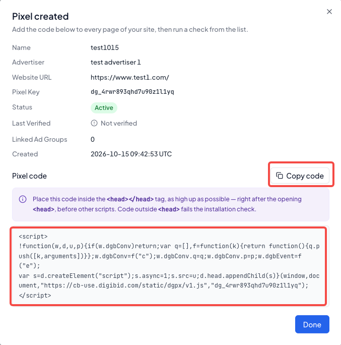 Pixel created 弹窗截图：显示 Pixel 的名称、广告主、网址、Pixel Key 和状态，下方 Copy code 按钮和 Pixel 基础代码区域被高亮